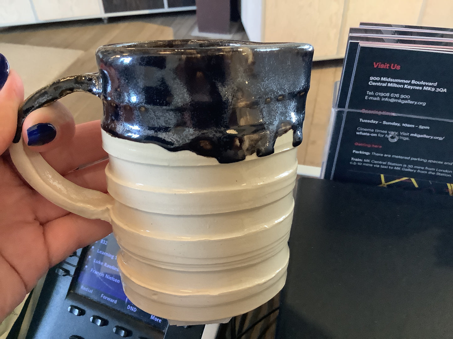 Susie Cousins Tall jug Cream with brown glaze.